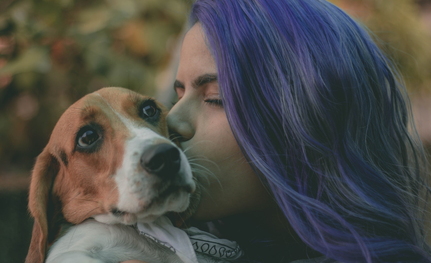 a highly sensitive person kisses her dog
