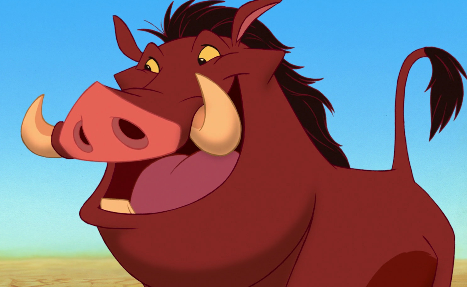 The character Pumbaa, a cartoon warthog from the Disney movie The Lion King, smiling.