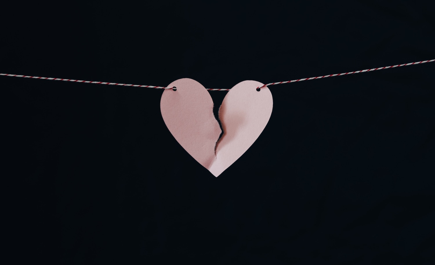 a broken paper heart represents an HSP's marriage ending