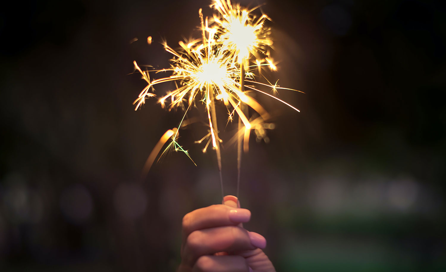 A highly sensitive person holds a sparkler