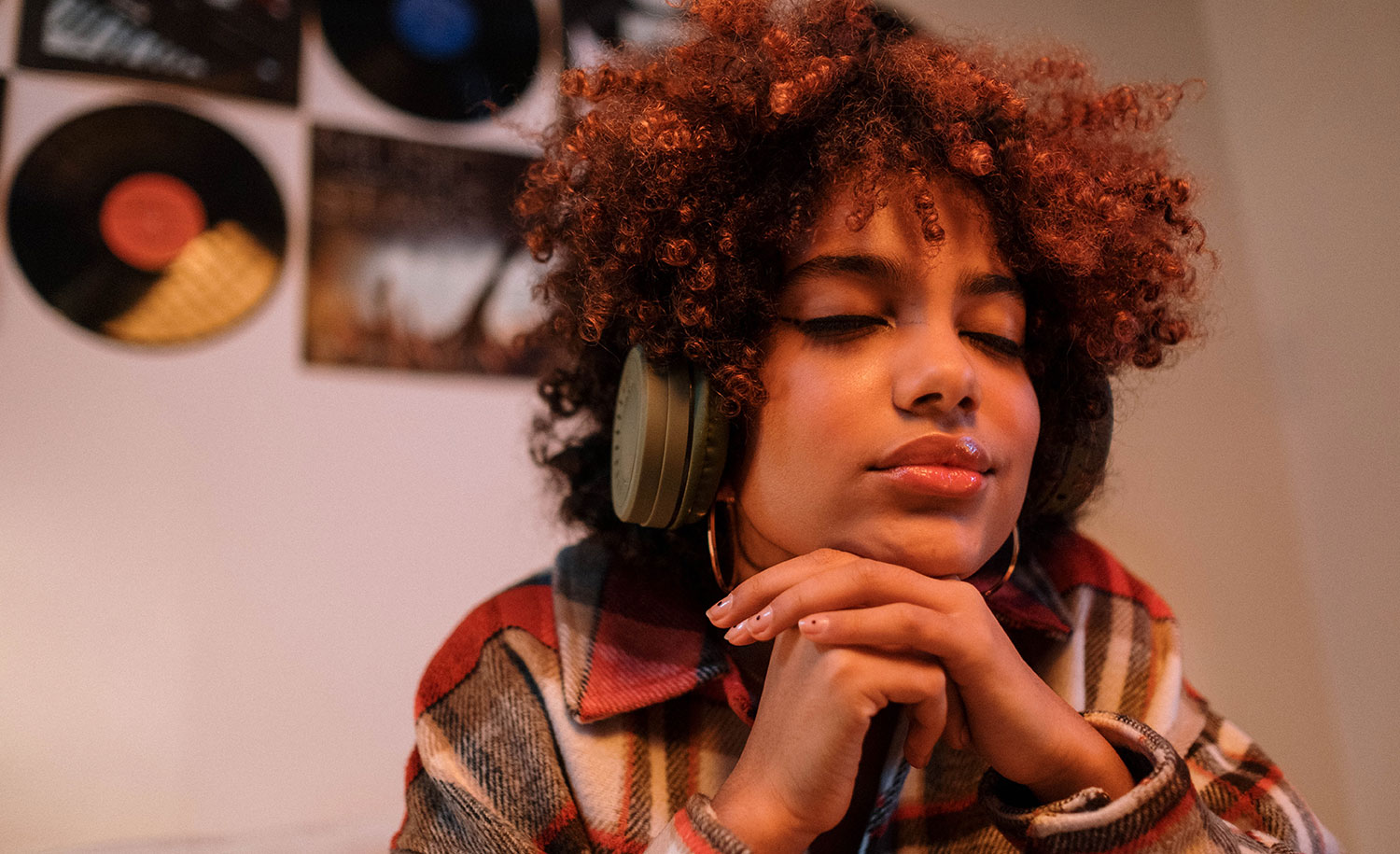 A highly sensitive woman relaxes and listens to music