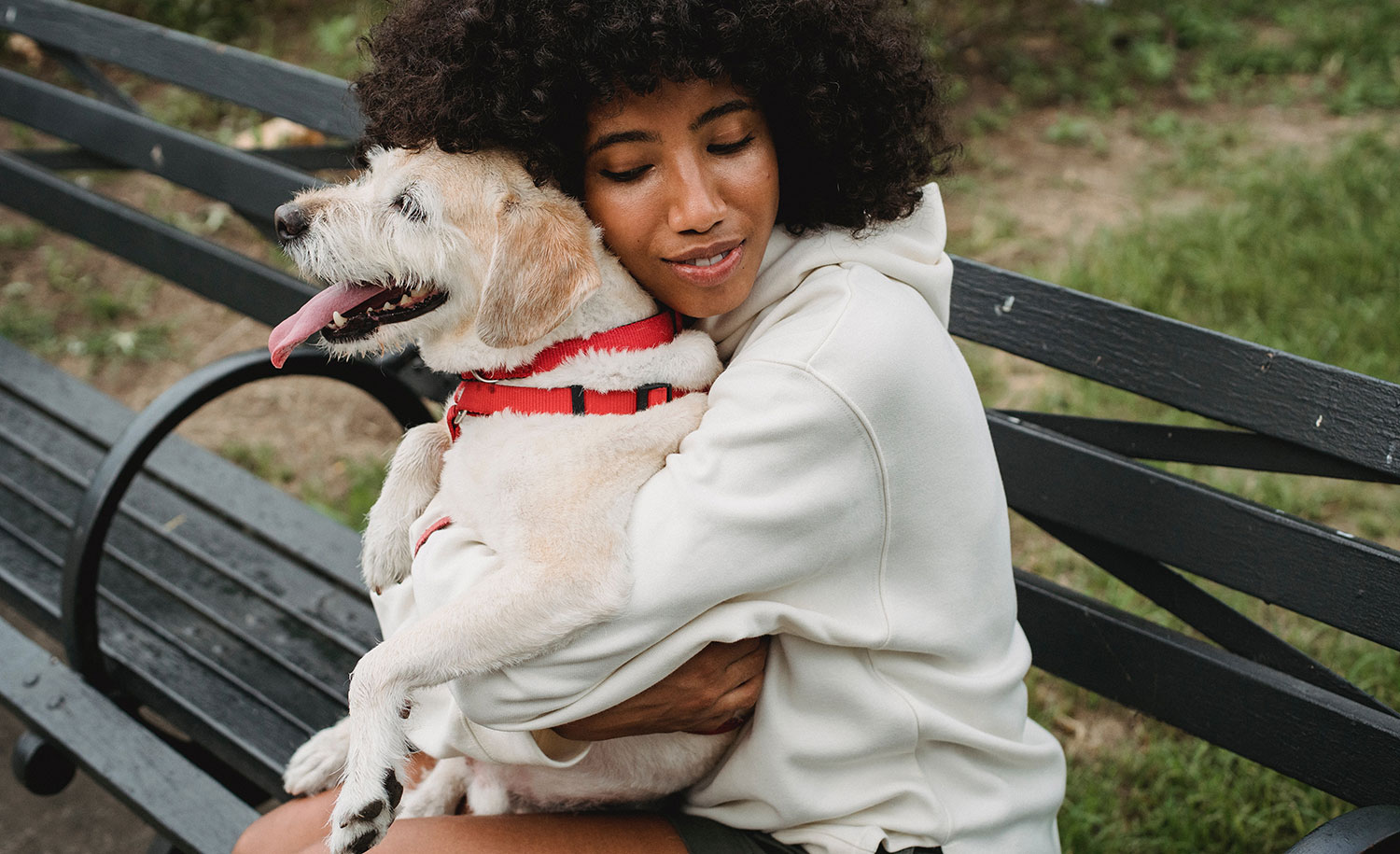 A highly sensitive person hugs her dog