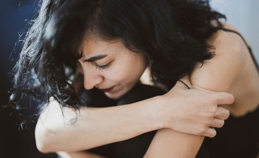 A highly sensitive woman in pain with a broken leg