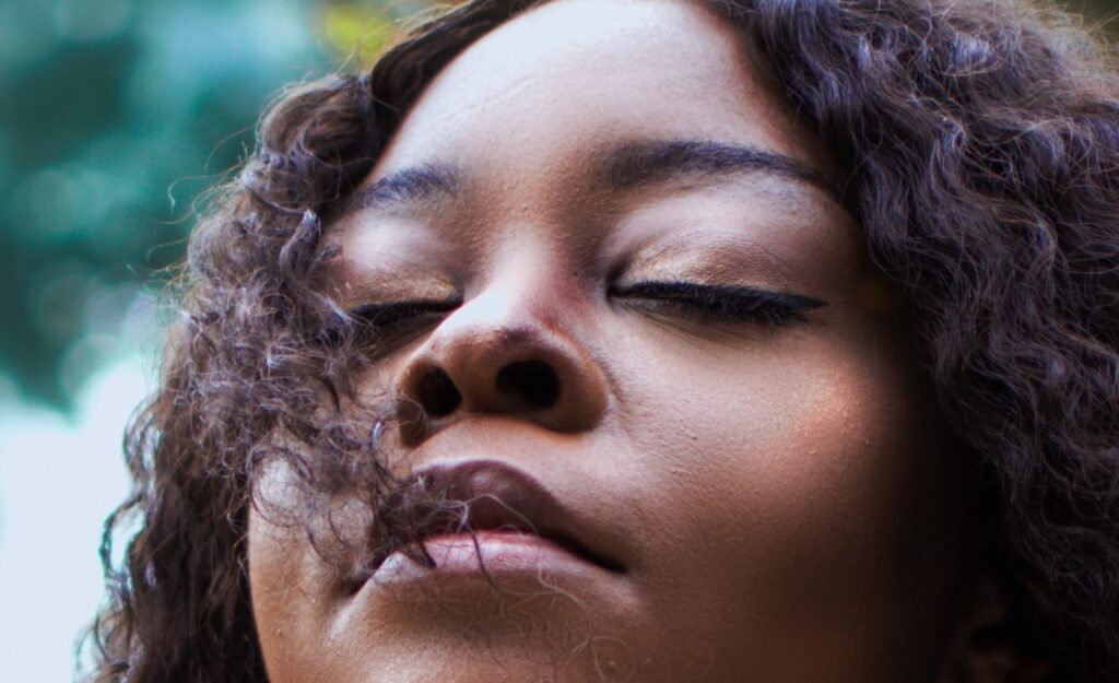 A highly sensitive person feeling at peace in the forest
