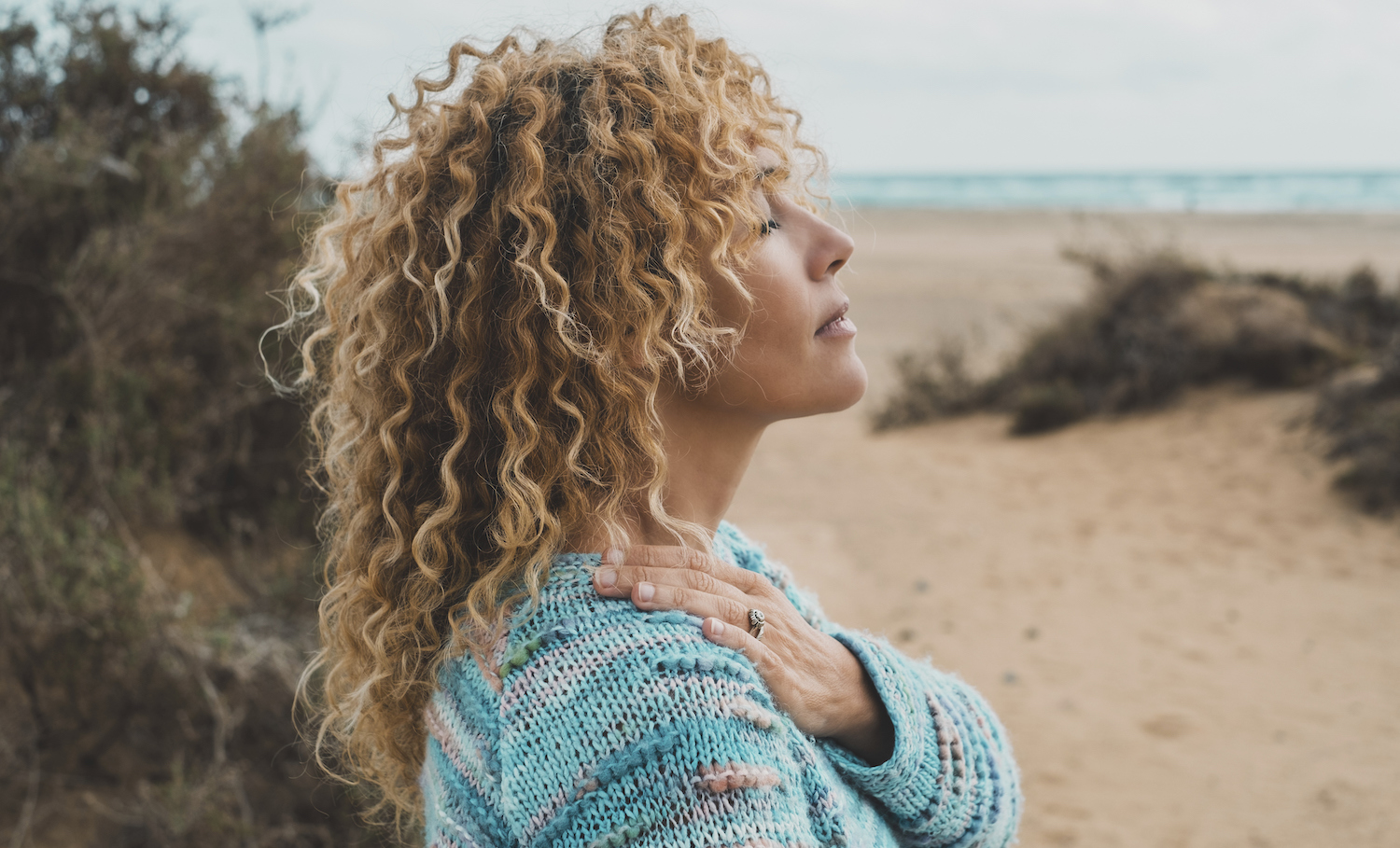 An HSP woman looking calm after overcoming her anxiety